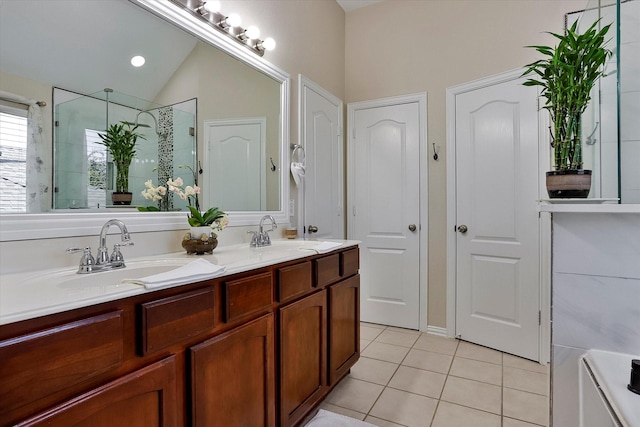 bathroom with tile patterned flooring, vanity, a shower with door, and lofted ceiling