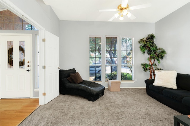 interior space featuring ceiling fan and plenty of natural light