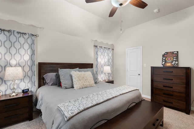 bedroom with ceiling fan, light carpet, and lofted ceiling