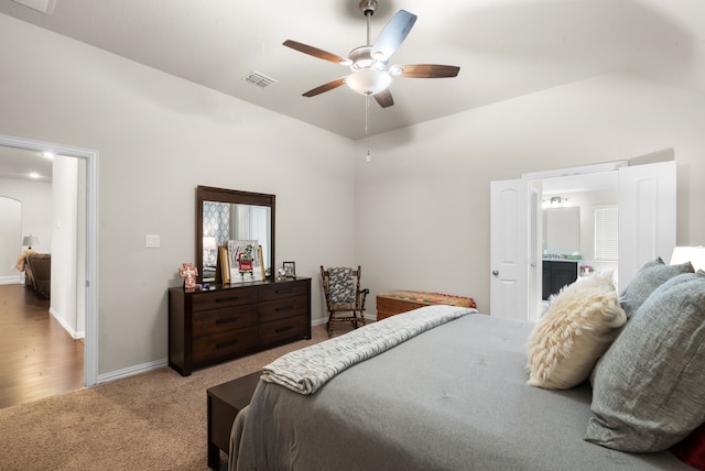 bedroom featuring ceiling fan and carpet