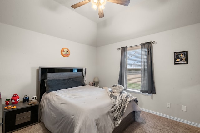 bedroom featuring lofted ceiling, light colored carpet, and ceiling fan