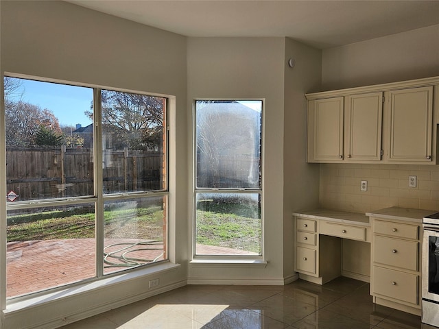 unfurnished office featuring a wealth of natural light