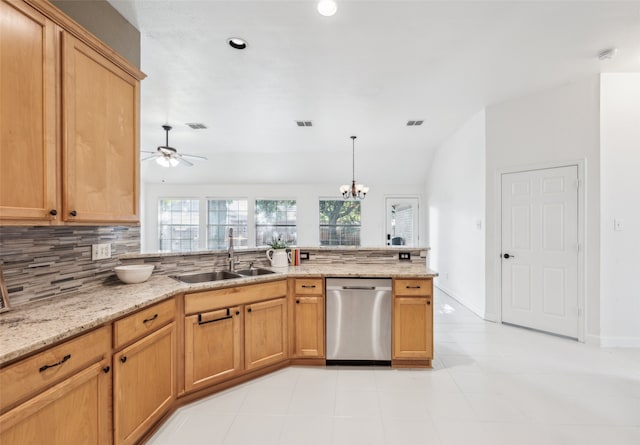 kitchen with ceiling fan with notable chandelier, sink, stainless steel dishwasher, tasteful backsplash, and light stone counters