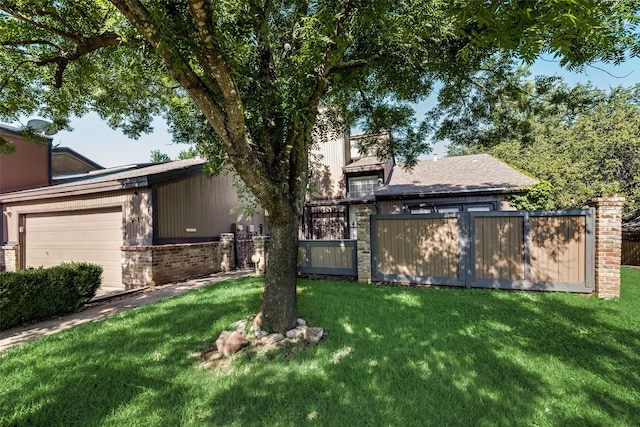 view of yard featuring a garage