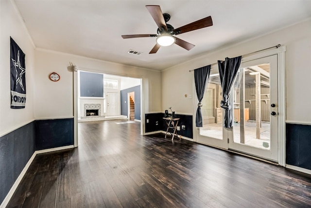 interior space featuring ceiling fan and dark wood-type flooring