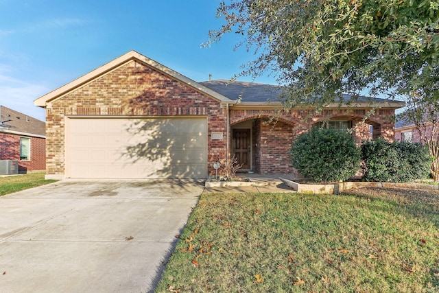 single story home with cooling unit, a front yard, and a garage