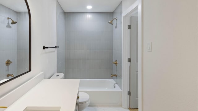 full bathroom with tile patterned floors, vanity, toilet, and tiled shower / bath