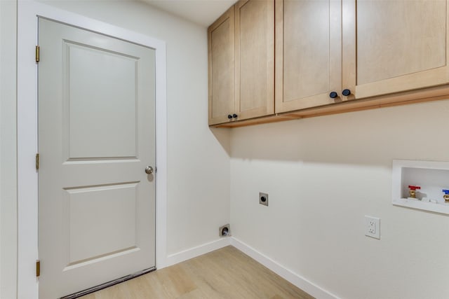 laundry room with cabinets, washer hookup, light hardwood / wood-style floors, and electric dryer hookup