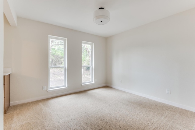 empty room with carpet floors