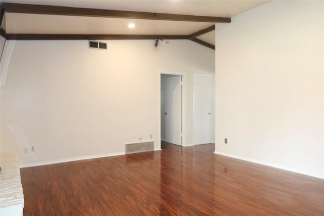 unfurnished room with dark hardwood / wood-style flooring and lofted ceiling with beams