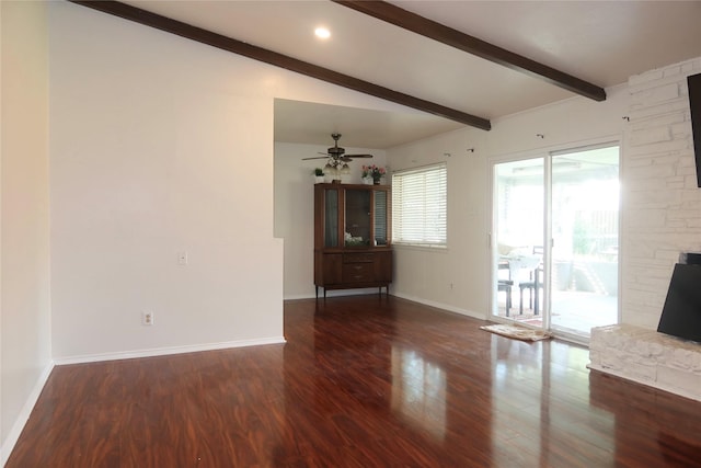 unfurnished living room with vaulted ceiling with beams, ceiling fan, and dark hardwood / wood-style floors