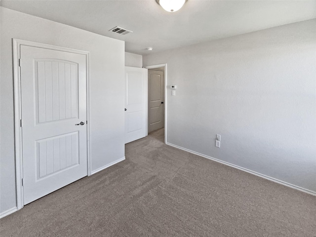 unfurnished bedroom featuring carpet floors