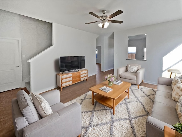 living room with ceiling fan and hardwood / wood-style floors