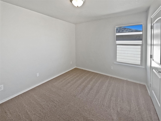 view of carpeted spare room