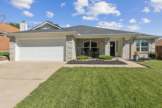 ranch-style home with a garage, a front yard, and covered porch