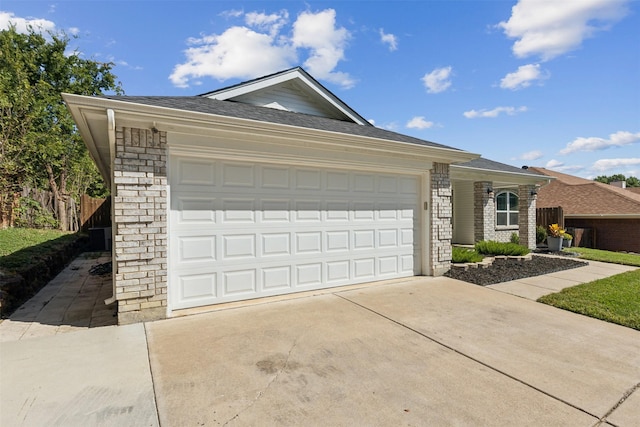 single story home with a garage