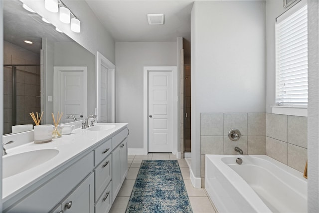 bathroom featuring tile patterned flooring, vanity, and independent shower and bath