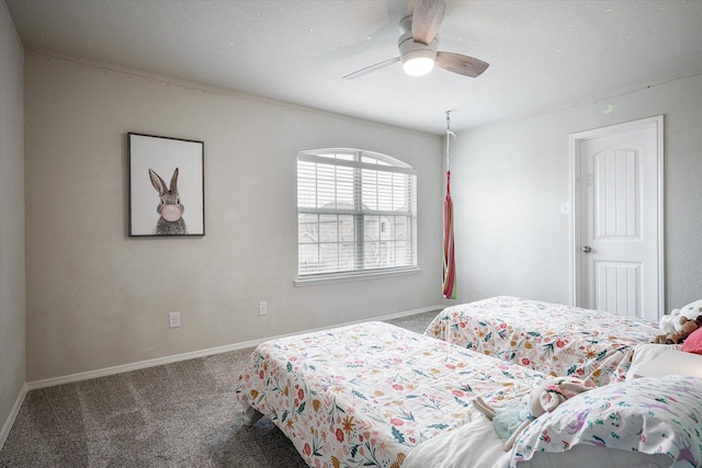 bedroom with ceiling fan and carpet floors