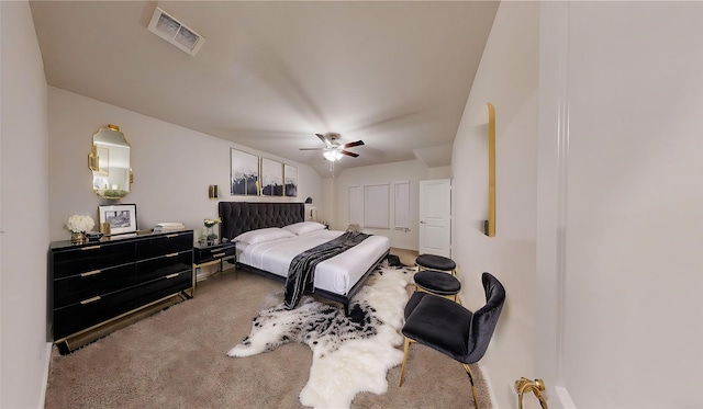 bedroom with ceiling fan and carpet floors