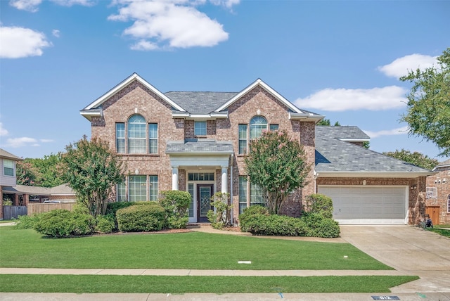 view of front of home with a front lawn