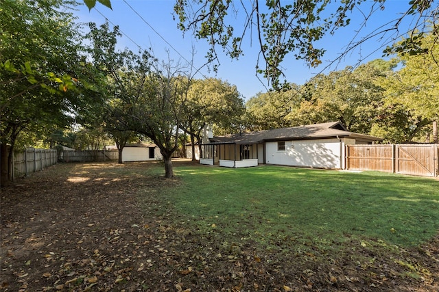 view of yard with a sunroom