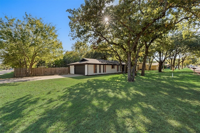 view of yard with a garage