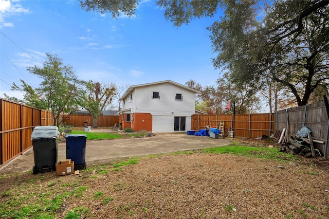 back of house featuring a patio