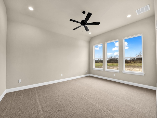 unfurnished room with carpet flooring and ceiling fan