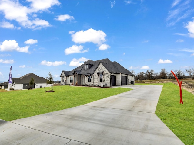 french country inspired facade featuring a front yard and a garage