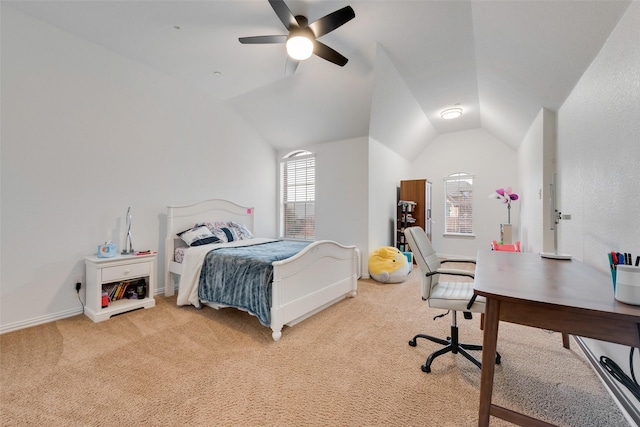 carpeted bedroom featuring vaulted ceiling and ceiling fan