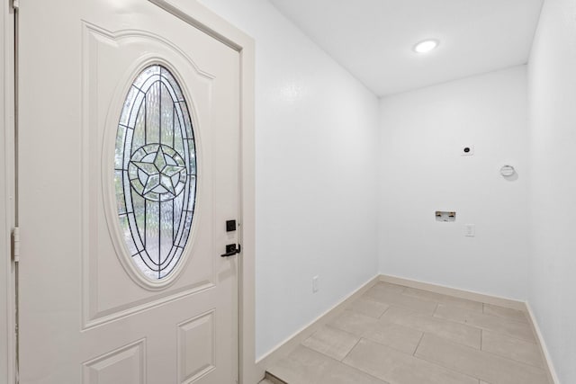 interior space featuring hookup for a washing machine, plenty of natural light, and electric dryer hookup