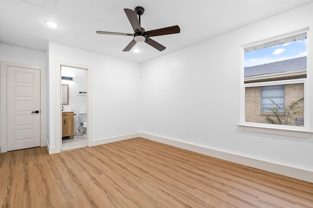 interior space featuring ceiling fan and light wood-type flooring