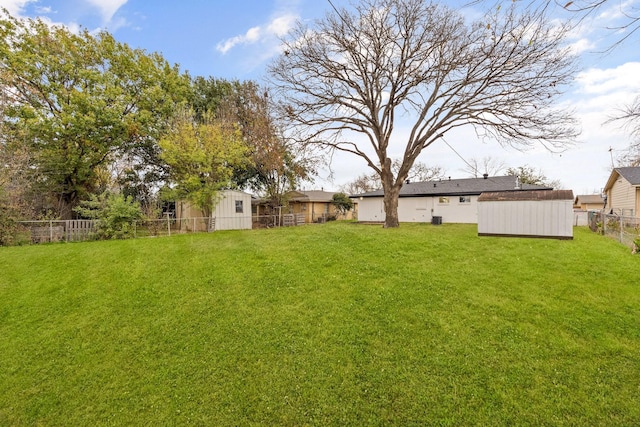 view of yard with a storage shed