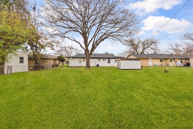 view of yard with a storage shed