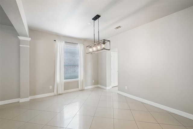 unfurnished dining area with light tile patterned flooring