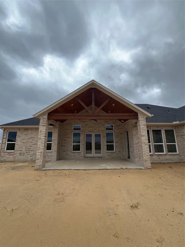 rear view of property with a patio area