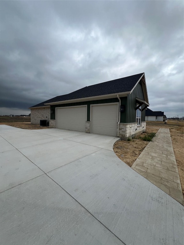 view of property exterior with a garage