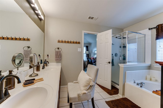 bathroom with tile patterned floors, plus walk in shower, and vanity