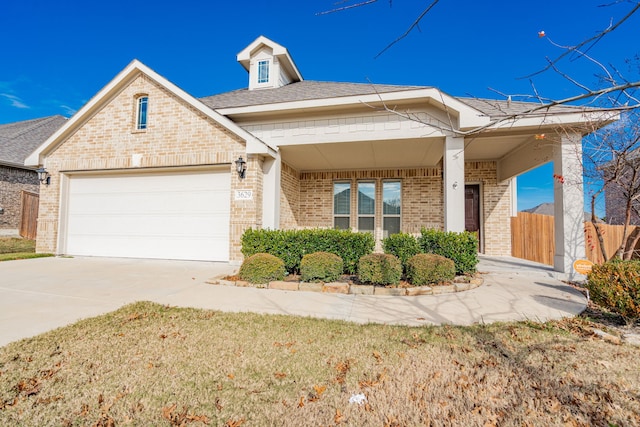 view of front of property featuring a garage