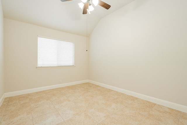 tiled spare room with ceiling fan and lofted ceiling