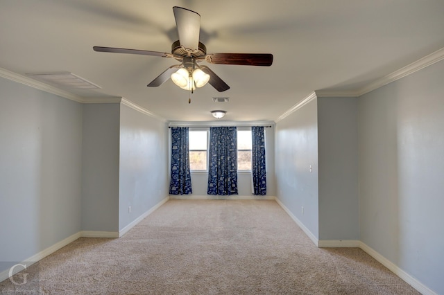 unfurnished room with light colored carpet, ceiling fan, and ornamental molding