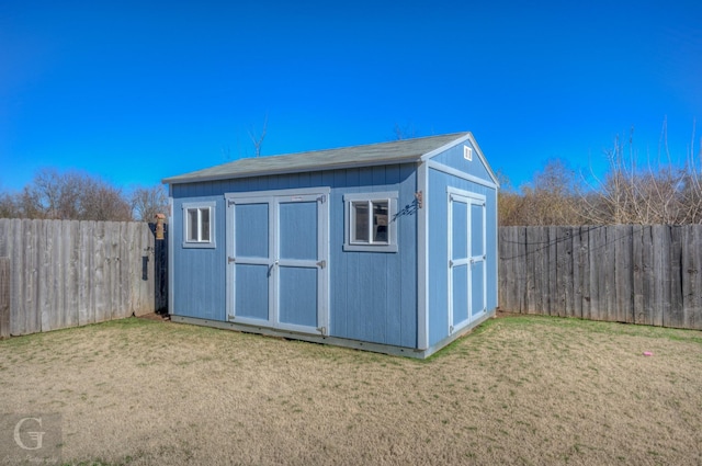 view of outdoor structure with a yard