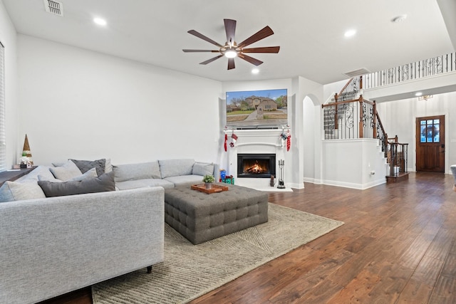 living room featuring dark wood-type flooring