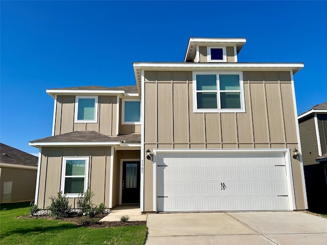 view of front of property featuring a garage