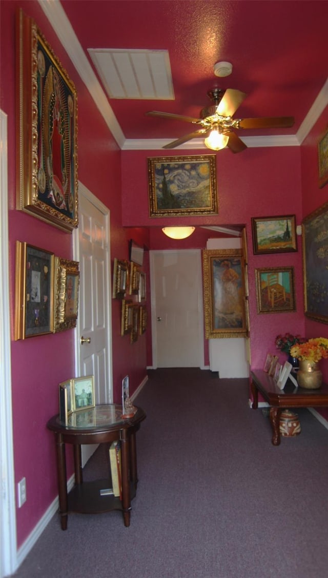 interior space featuring crown molding, ceiling fan, and carpet