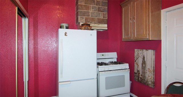 kitchen featuring white appliances