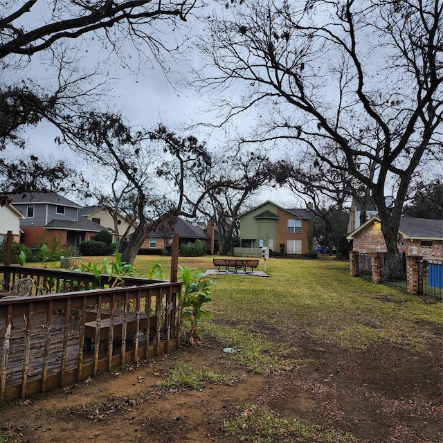 view of yard with a wooden deck