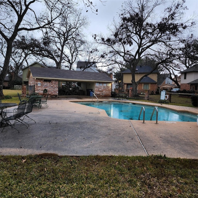 view of pool featuring a patio