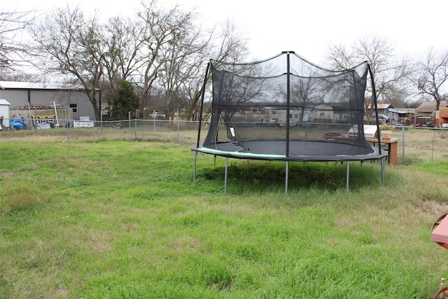 view of yard featuring a trampoline