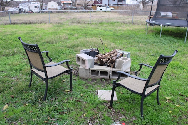 view of yard with a trampoline